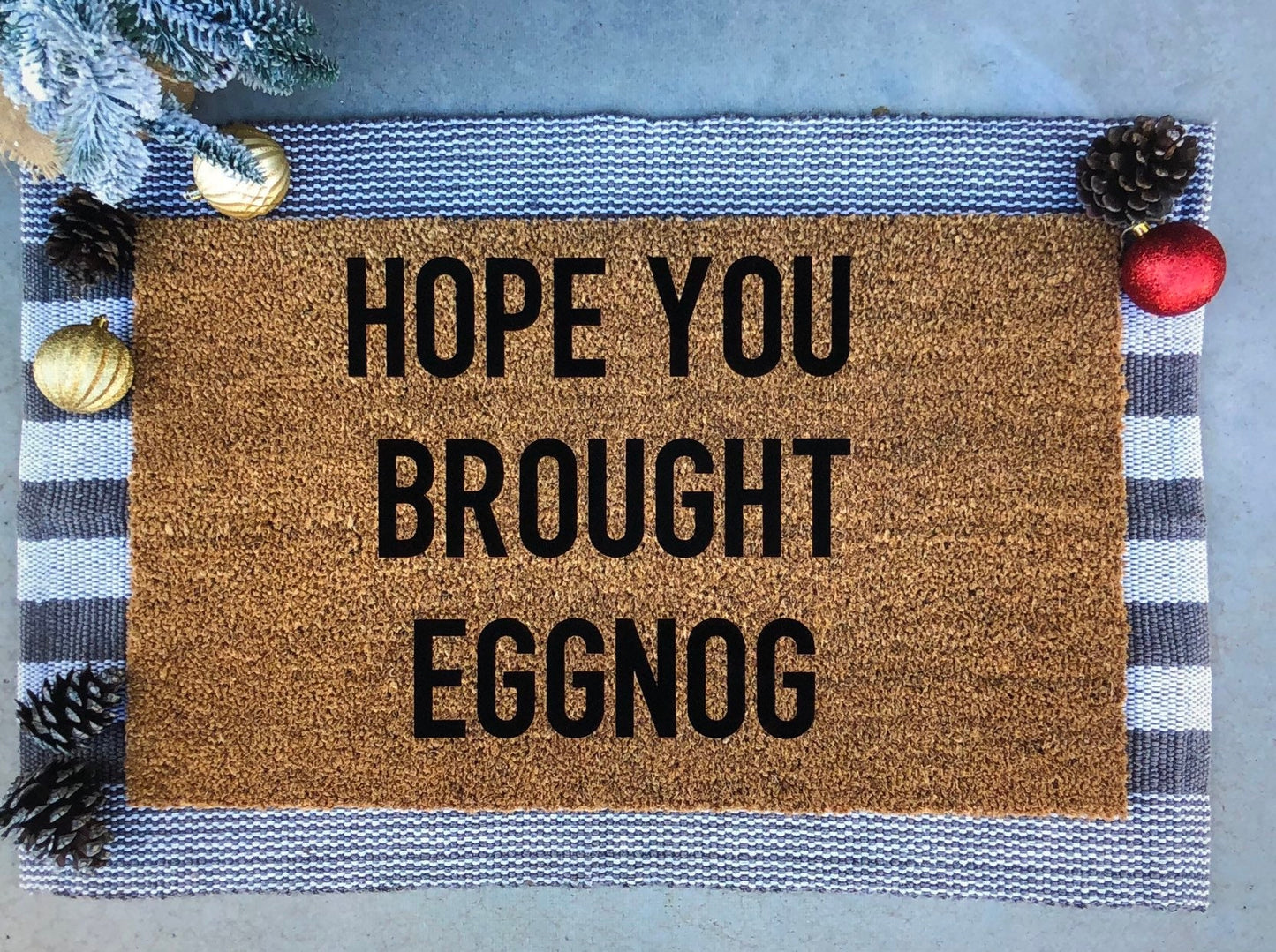 hope you brought eggnog doormat