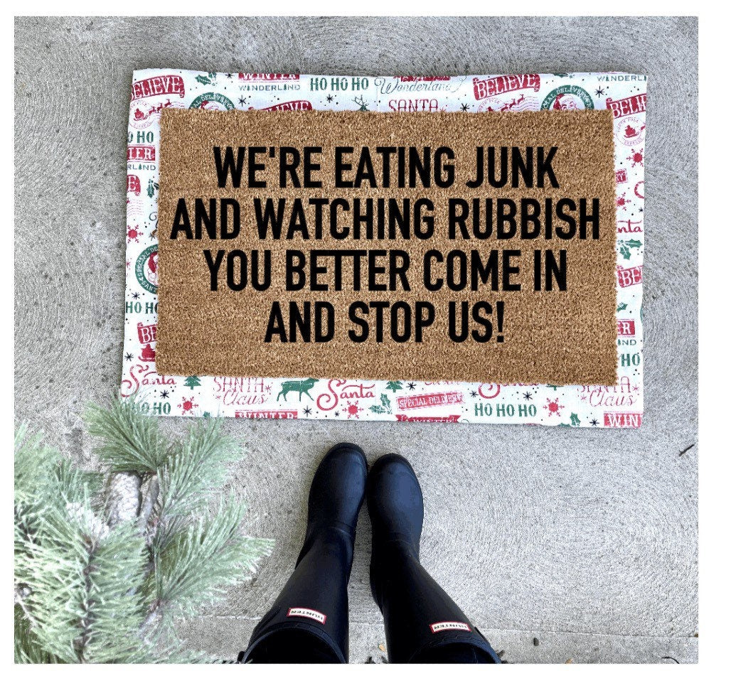 We’re eating junk and watching rubbish you better come in and stop me doormat, home alone doormat, Christmas doormat