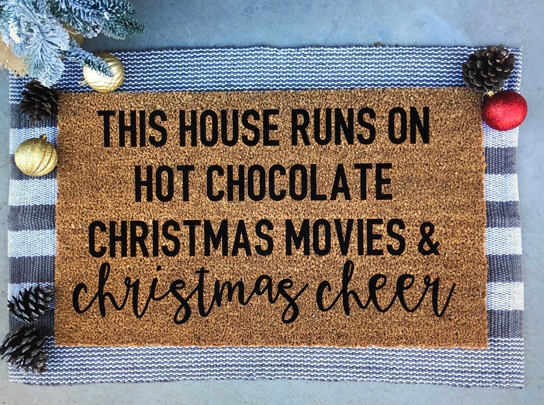 this house runs on hot chocolate, christmas movies and christmas cheer doormat