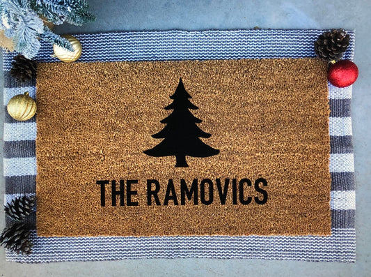 custom last name doormat with pine tree