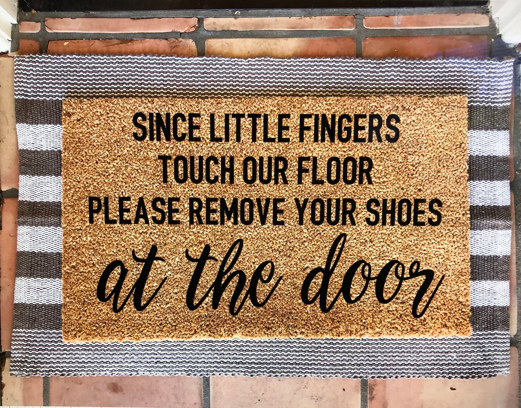 Since little fingers touch our floor please remove your shoes at the door - door mat