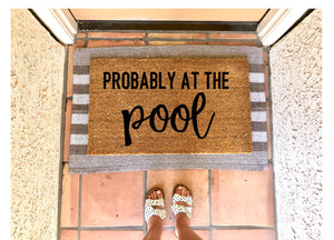 Probably at the pool doormat, swimming pool doormat, cute doormat