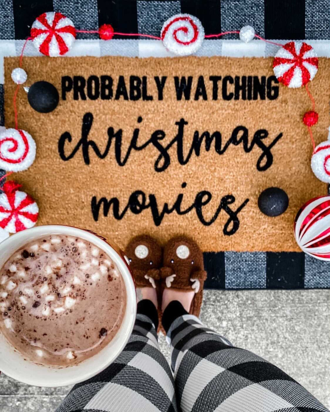 probably watching christmas movies doormat