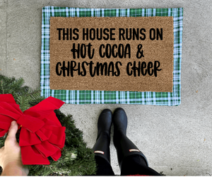 This house runs on hot cocoa and christmas cheer doormat