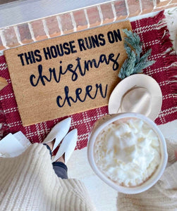 this house runs on christmas cheer doormat